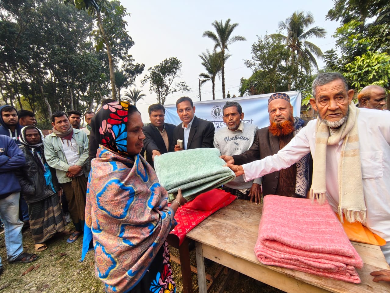 Blanket distribution event photo 1